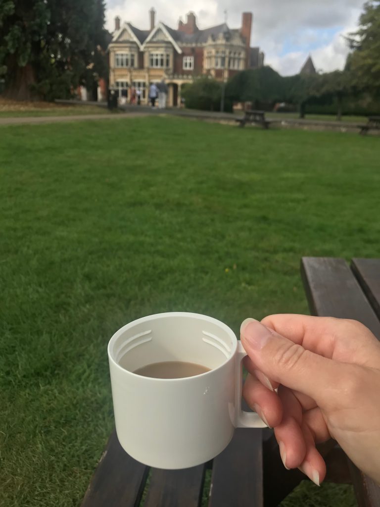 A cup of tea in my flask as I sit and look at the Manor House at Bletchley Park.